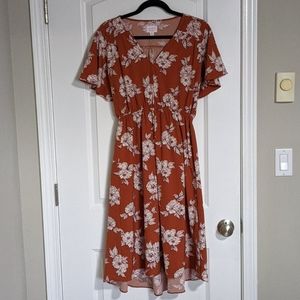 Isabella maternity burnt orange floral dress.
